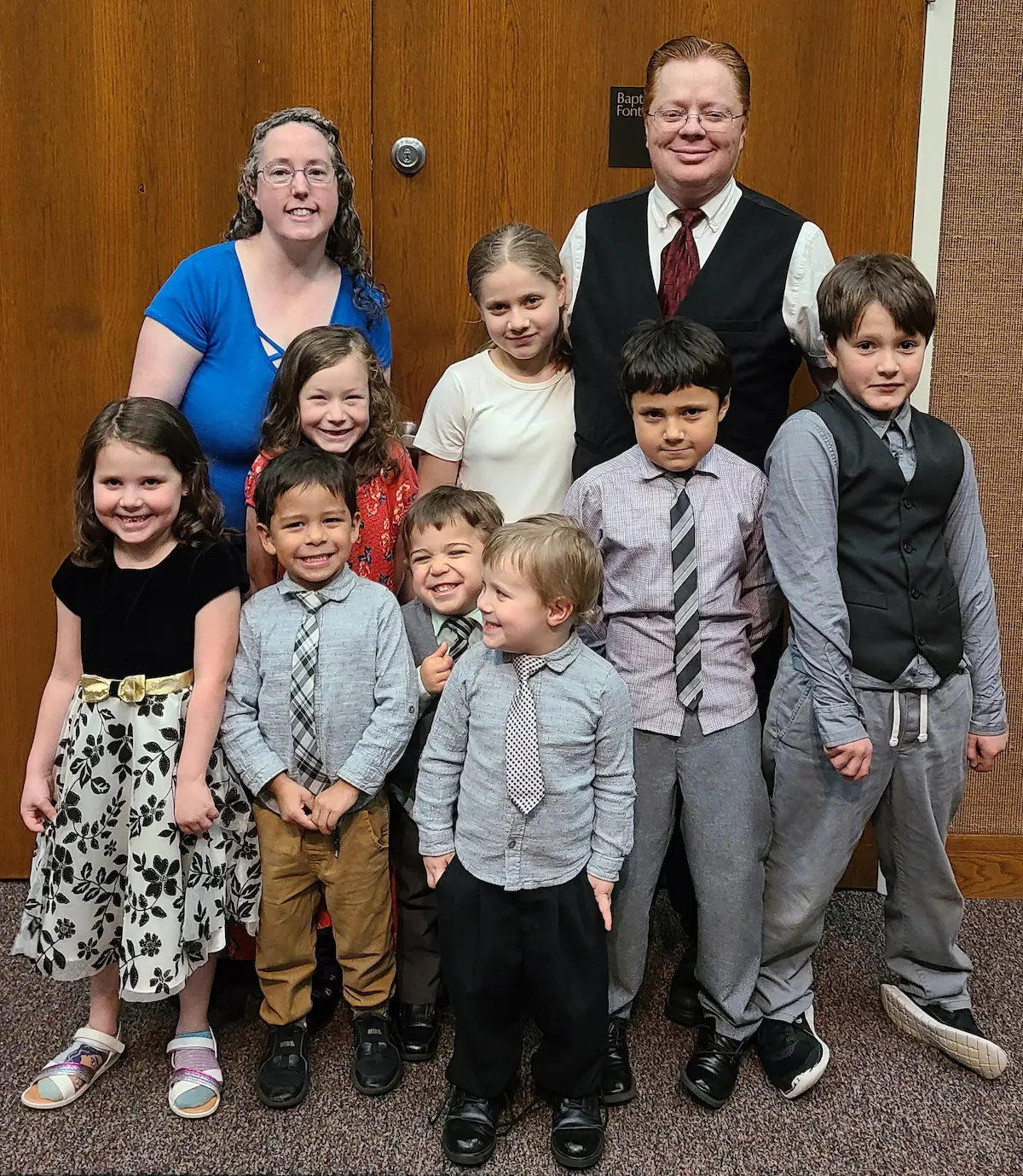 The Westover family dressed up together at church — a formal family moment showing the life Jason is building